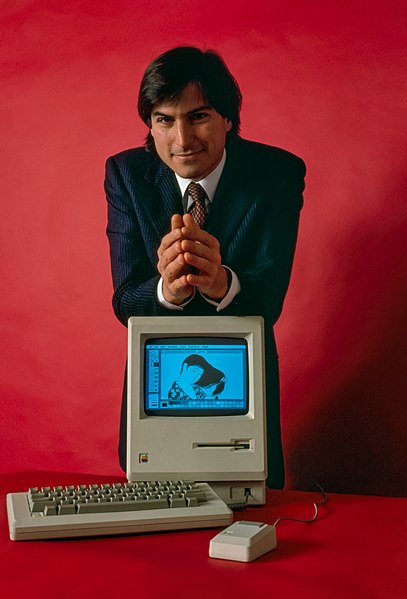 Steve_Jobs_and_Macintosh_computer,_January_1984,_by_Bernard_Gotfryd_-_edited.jpg